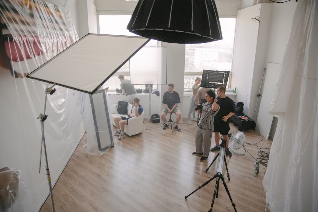 Production team collaborating in a studio