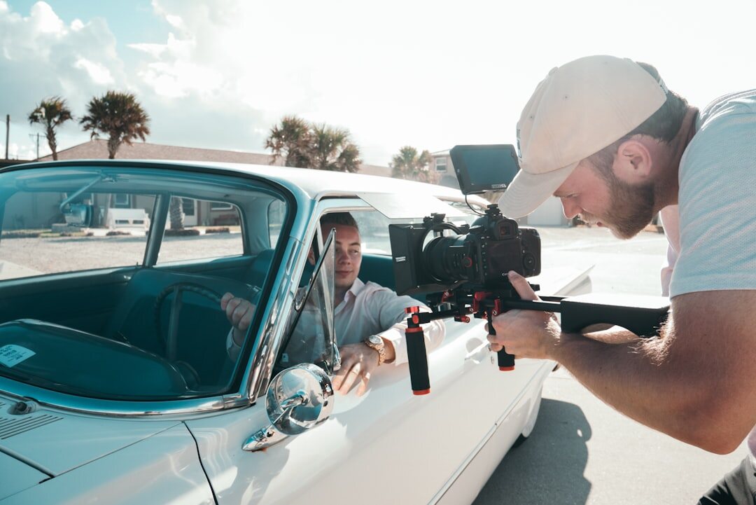 Cameraman framing a shot on set